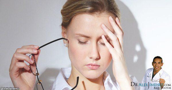 blog picture of lady touching head with headache