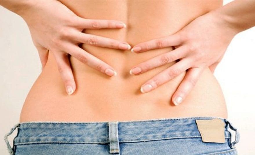blog picture of lady with lower back pain