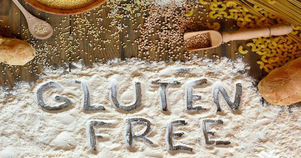 blog picture of various grains and flour with the words gluten free spelled into the flour