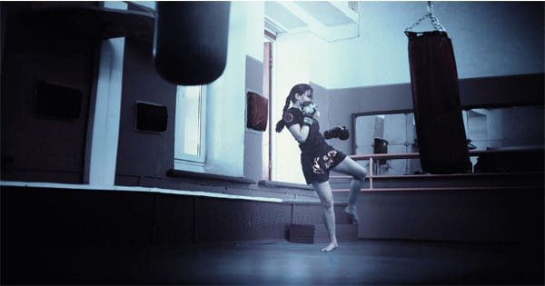 blog picture of female kick boxer practicing