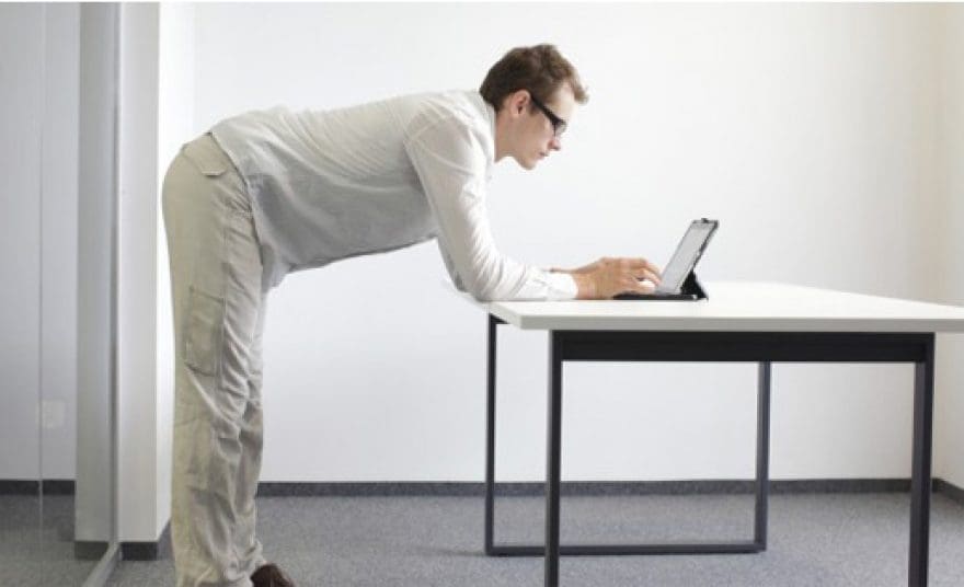 blog picture of man standing at desk