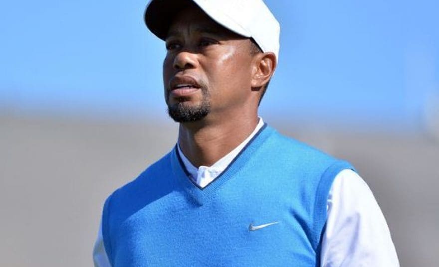 tiger woods playing golf
