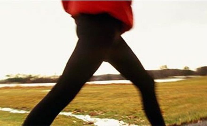 blog picture of woman walking in a field